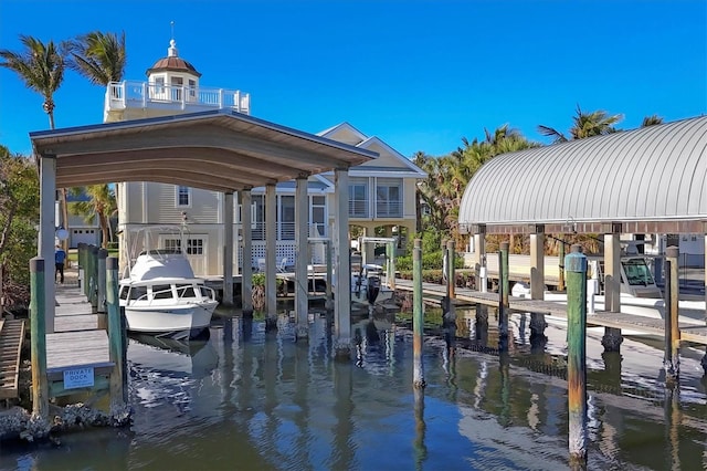 dock area with a water view