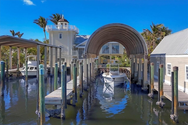 dock area featuring a water view