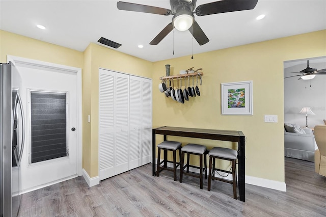 dining area with light hardwood / wood-style flooring