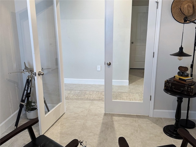 bathroom featuring tile patterned flooring and french doors