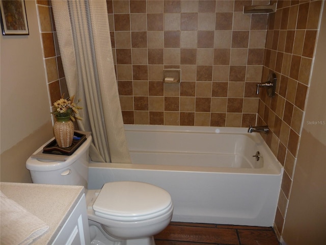 full bathroom with vanity, toilet, and shower / bath combo with shower curtain