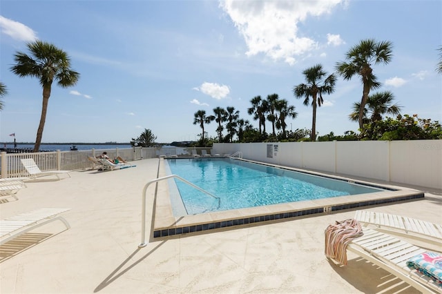 view of swimming pool with a patio area