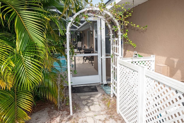 97 Mariner Ln, Rotonda West, FL 33947 - property entrance with stucco siding