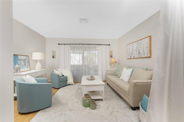 living room with hardwood / wood-style flooring