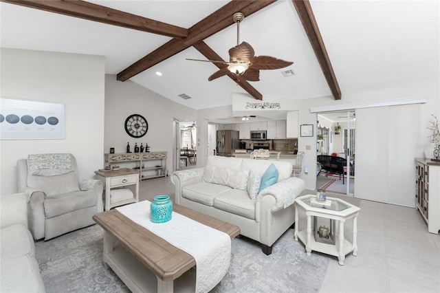 living room with vaulted ceiling with beams and ceiling fan