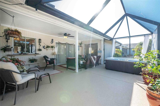 sunroom / solarium with ceiling fan