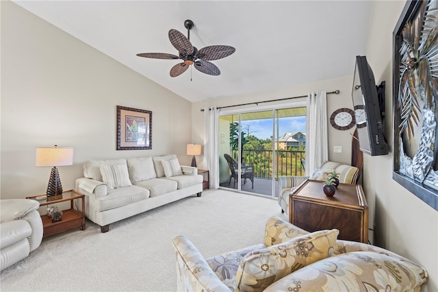 carpeted living room featuring ceiling fan and vaulted ceiling