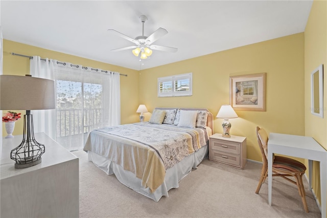 bedroom featuring light colored carpet and ceiling fan