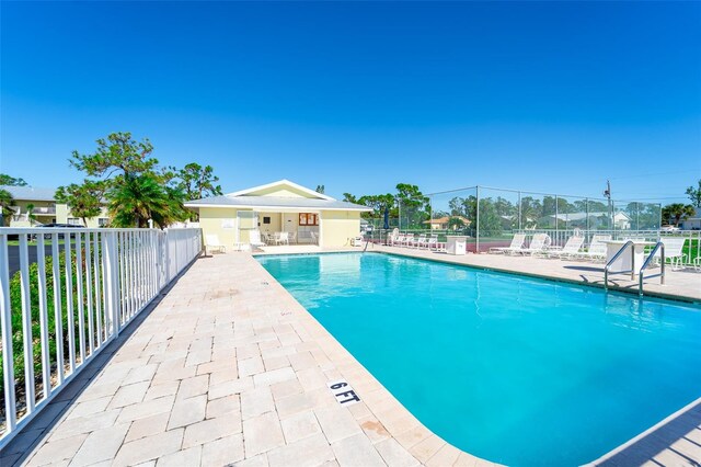 view of swimming pool featuring a patio