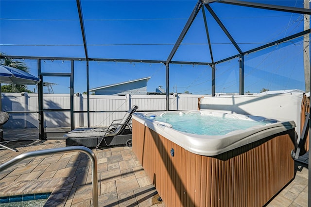 view of patio with a hot tub