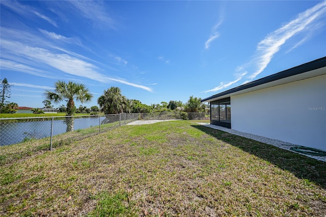 view of yard with a water view