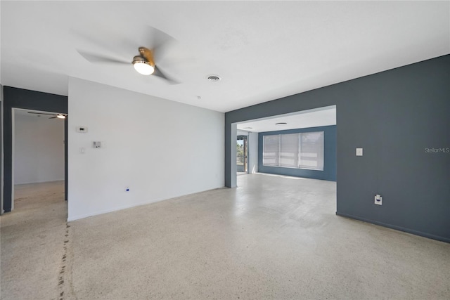 unfurnished room with ceiling fan