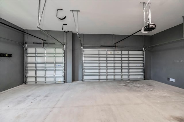 garage featuring a garage door opener