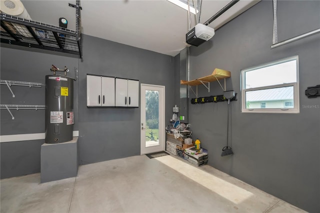 garage with a garage door opener and water heater