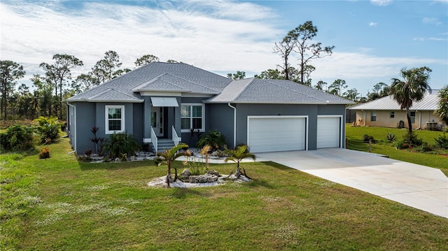 single story home featuring a garage and a front lawn