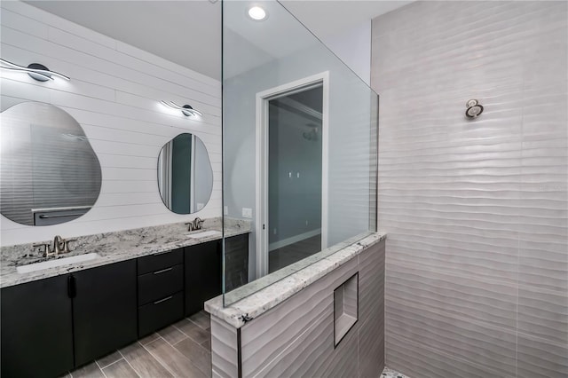 bathroom with vanity and hardwood / wood-style flooring