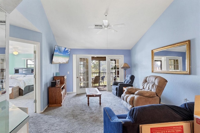 living room with ceiling fan, light colored carpet, lofted ceiling, and french doors