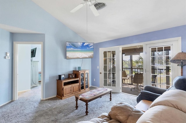 carpeted living room with high vaulted ceiling and ceiling fan