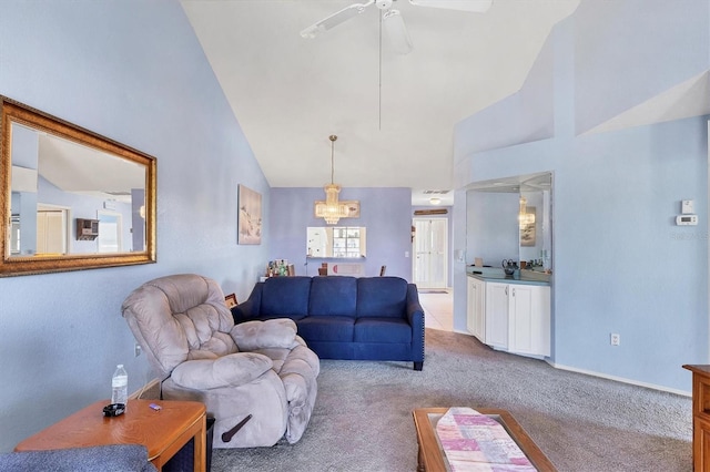 living room with light carpet, high vaulted ceiling, and ceiling fan