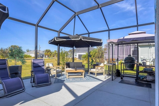 view of patio / terrace featuring a lanai, outdoor lounge area, and area for grilling