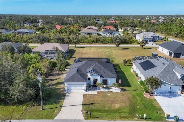 birds eye view of property with a residential view