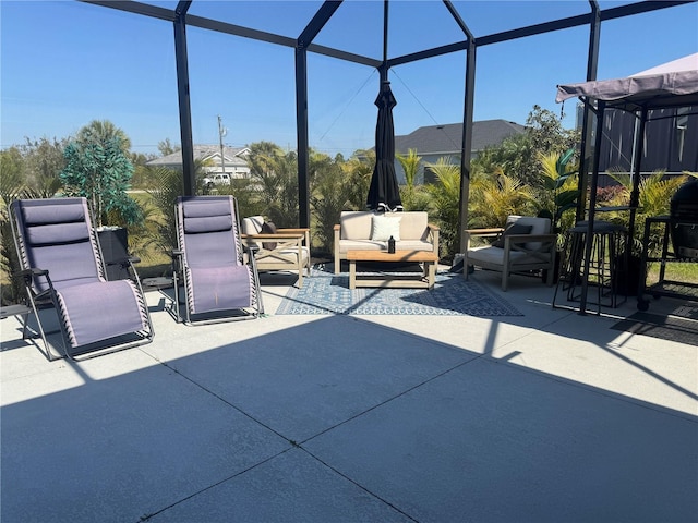 view of patio / terrace with an outdoor hangout area and a lanai
