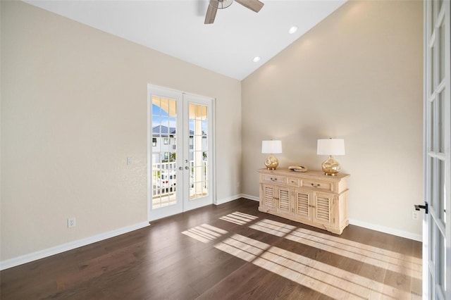 interior space featuring french doors, dark hardwood / wood-style flooring, high vaulted ceiling, and ceiling fan