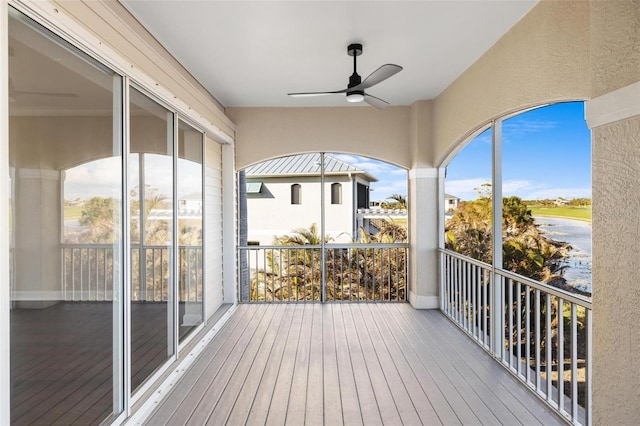 wooden deck with ceiling fan