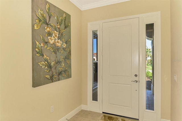 tiled foyer with crown molding