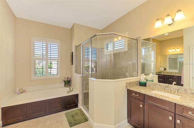 bathroom featuring vanity, tile patterned floors, and independent shower and bath