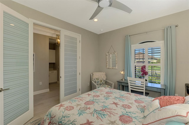 bedroom featuring ceiling fan and light hardwood / wood-style flooring