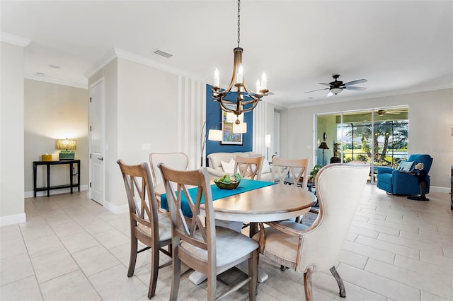 tiled dining room featuring crown molding and ceiling fan with notable chandelier