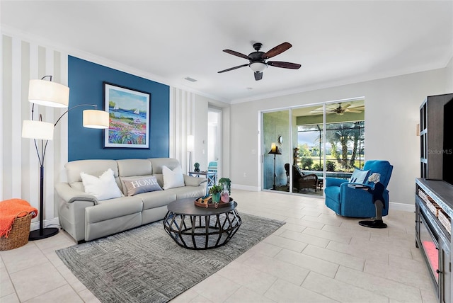 living room featuring ceiling fan, ornamental molding, and light tile patterned floors