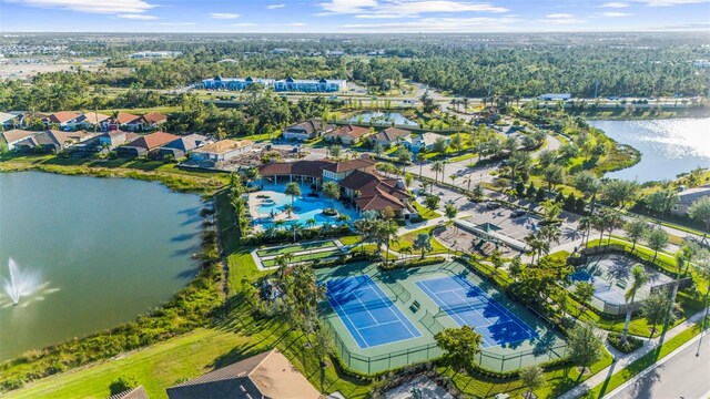 birds eye view of property featuring a water view