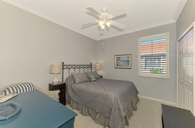 bedroom featuring light carpet, a closet, crown molding, and ceiling fan