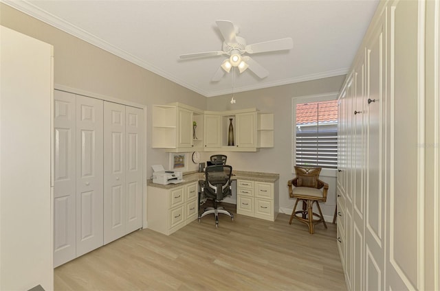 home office with ceiling fan, light hardwood / wood-style floors, and crown molding