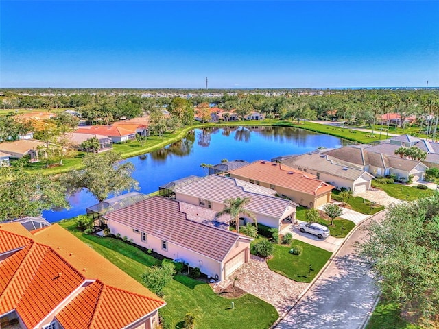 birds eye view of property featuring a water view