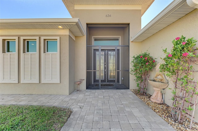 view of exterior entry with french doors