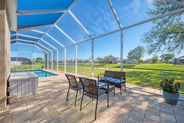 view of pool with an outdoor hangout area, a lanai, a patio area, and a lawn