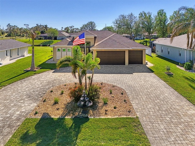 ranch-style home with a front lawn and a garage