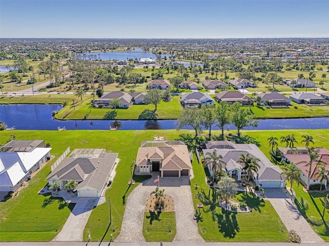 drone / aerial view featuring a water view