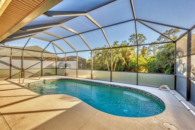 2 Marker Rd, Rotonda West, FL 33947 - swimming pool featuring a patio and a lanai