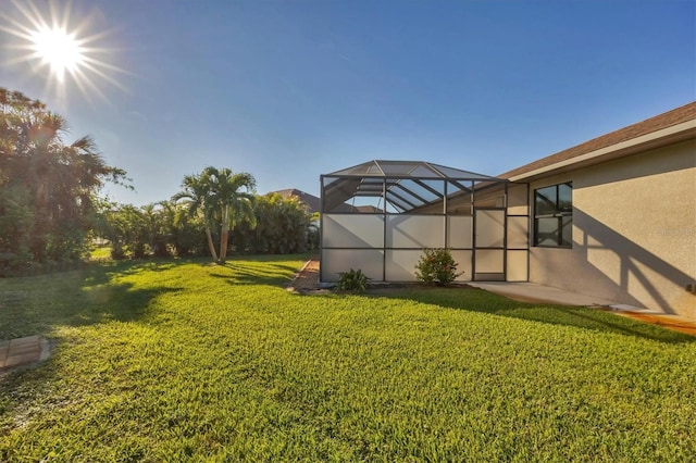2 Marker Rd, Rotonda West, FL 33947 - view of green lawn with glass enclosure