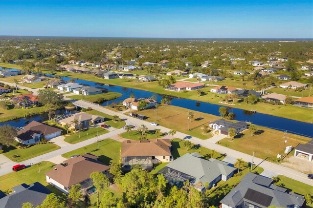 2 Marker Rd, Rotonda West, FL 33947 - aerial view of residential area with a large body of water