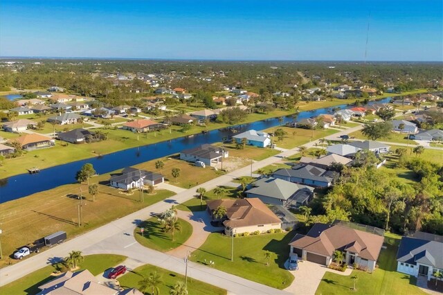 2 Marker Rd, Rotonda West, FL 33947 - aerial perspective of suburban area with a large body of water