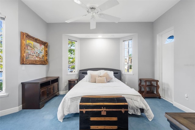 carpeted bedroom with ceiling fan