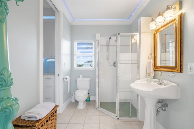 bathroom featuring walk in shower, tile patterned floors, and toilet