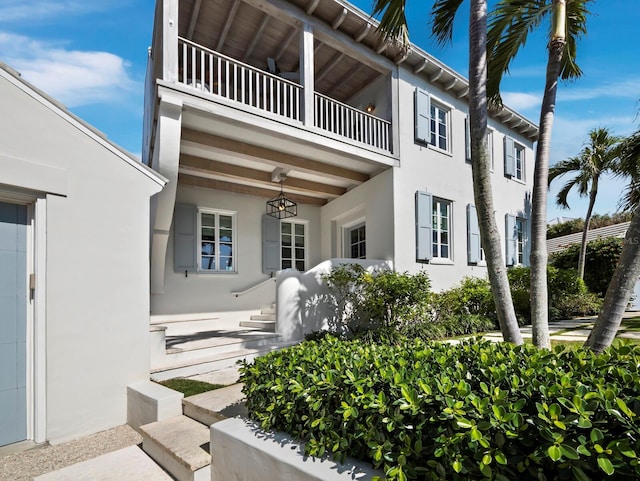 exterior space featuring a balcony