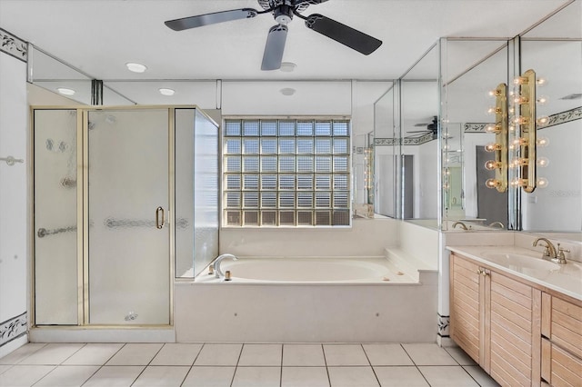 bathroom with tile patterned floors, ceiling fan, vanity, and independent shower and bath