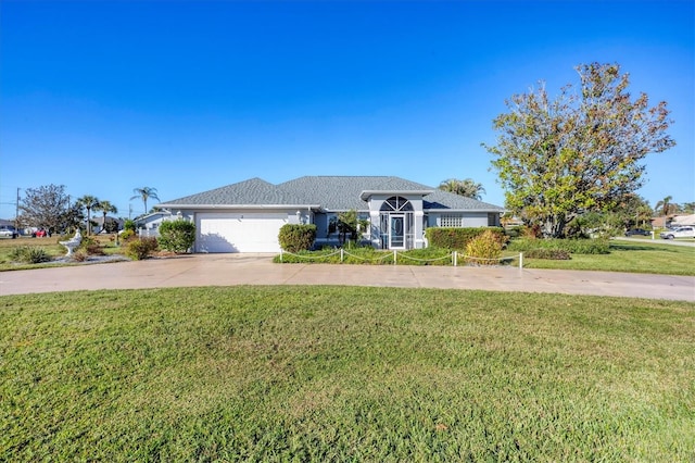 single story home with a garage and a front yard